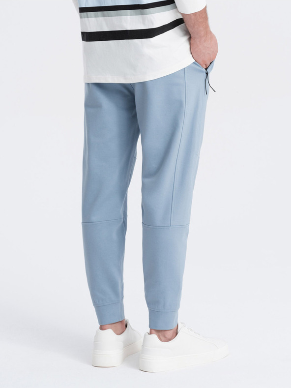 Ombre Clothing Pantaloni de trening basic albastru deschis pentru bărbați Ombre Clothing